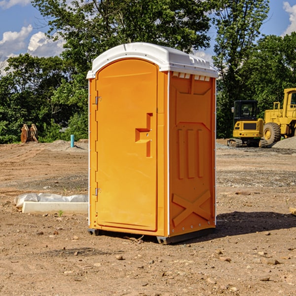 how often are the porta potties cleaned and serviced during a rental period in Town and Country